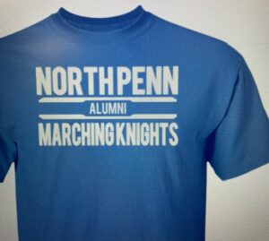 Columbia blue t-shirt with white text reading North Penn Marching Knights Alumni.